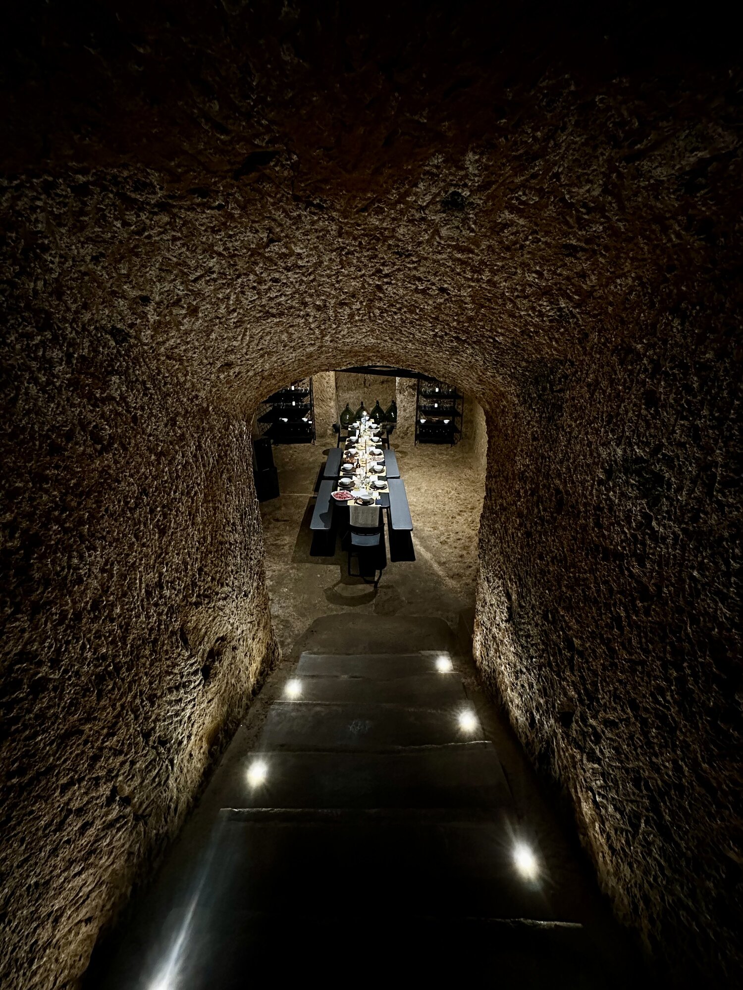 Tuff-stone cellar tunnel beneath Palazzo Palloni.